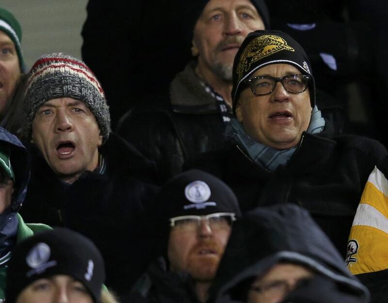 Actors Martin Short and Tom Hanks sit in the stands watching the 101st Grey Cup. Todd Korol / Reuters