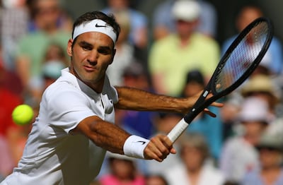 File-This July 14, 2017, file photo shows Switzerland's Roger Federer returns to Czech Republic's Tomas Berdych during their Men's Singles semifinal match on day eleven at the Wimbledon Tennis Championships in London.  Federer and Rafael Nadal are on the same side of the US Open men's bracket, released Friday, Aug. 25, 2017,  meaning they could meet only in the semifinals. (Gareth Fuller/Pool Photo via AP, File)