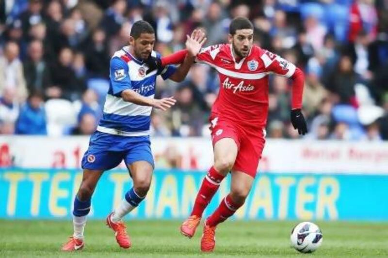 Pavel Pogrebnyak, left, and Adam Le Fondre of Reading are dejected after failing to score Sunday against QPR. Richard Heathcote / Getty Images