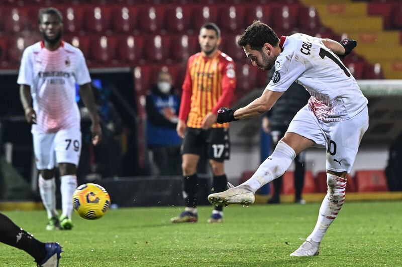 Milan's Hakan Calhanoglu shoots on goal. AFP