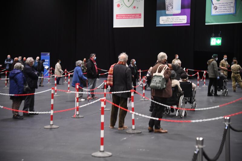 People queue inside the Excel Centre in London. Getty Images