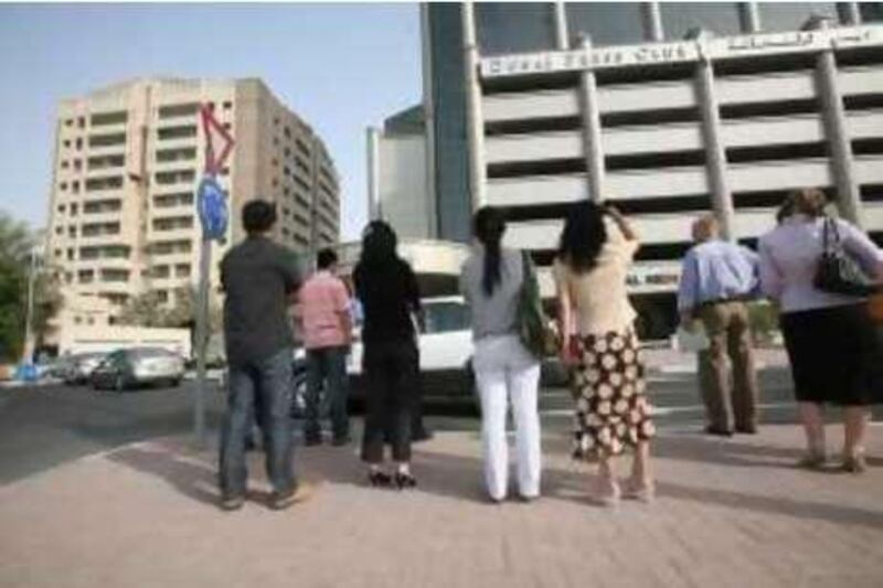 DUBAI, UNITED ARAB EMIRATES - September 10:  The Al Thurayah building in Media City is evacuated after an earth tremor originating from Iran is felt in Dubai on September 10, 2008.  (Randi Sokoloff / The National)   *** Local Caption ***  RS007-TREMOR.jpg