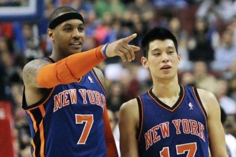 When Carmelo Anthony, left, was out injured, Jeremy Lin, right, and the Knicks on a winning streak. Anthony has since returned and New York's fortunes have gone like this: win some, lose more.