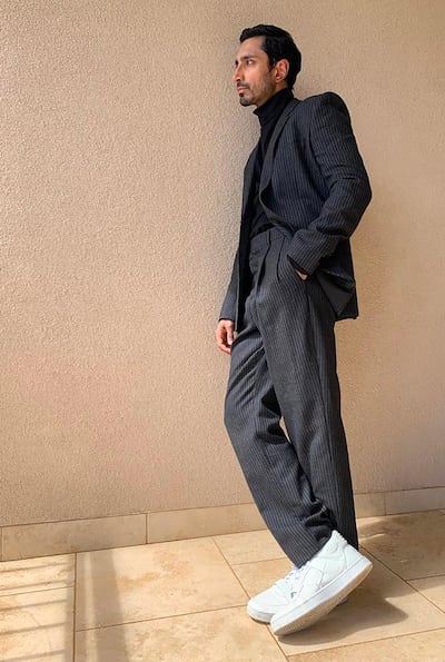 Riz Ahmed wears a relaxed Celine suit to attend the 2021 Golden Globes from home. Instagram 