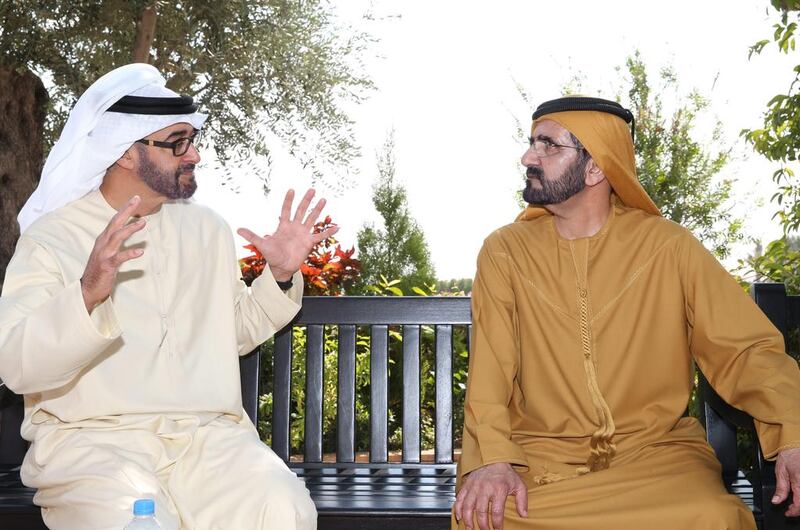 Sheikh Mohammed bin Rashid, Ruler of Dubai and Prime Minister of the UAE, right, receives Sheikh Mohammed bin Zayed, left. Wam