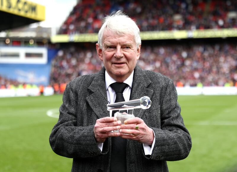 Motson receives an award for his services to football commentary at Selhurst Park, south London, in 2018. Getty Images