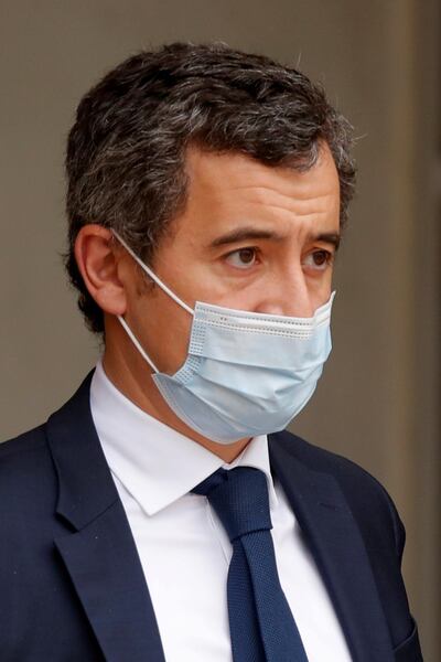 FILE PHOTO: French Interior Minister Gerald Darmanin, wearing a protective face mask, leaves after the weekly cabinet meeting at the Elysee Palace in Paris, France, November 25, 2020. REUTERS/Charles Platiau/File Photo