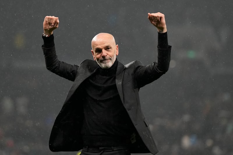 AC Milan manager Stefano Pioli celebrates at the end of the match. AP