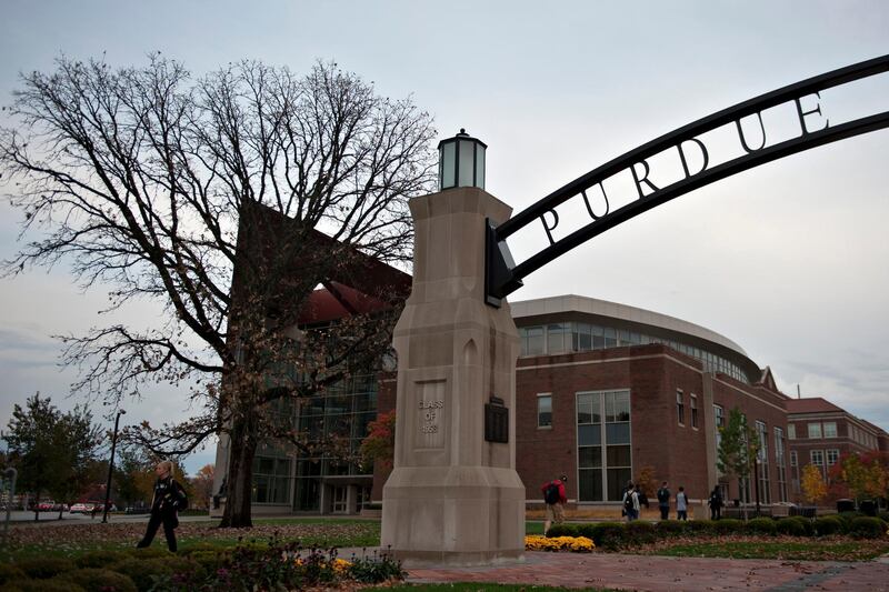 A large archway stands over the entrance to Stadium Mall on the campus of Purdue University in West Lafayette, Indiana, U.S., on Monday, Oct. 22, 2012. Photographer:  Daniel Acker