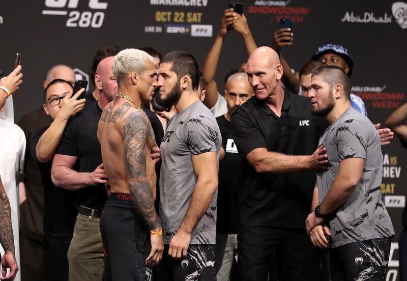 Charles Oliveira and Islam Makhachev at the ceremonial weigh in before their lightweight title fight at UFC 280 in Abu Dhabi. Chris Whiteoak / The National