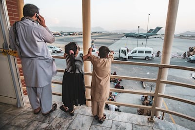 Afghans and foreigners are trying to secure places on flights from Kabul airport. Photo: AFP