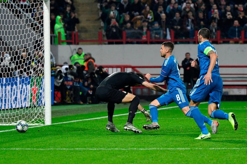 Aaron Ramsey follows up Cristiano Ronaldo's free-kick before scoring from close range. AFP