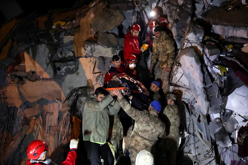 Cennet Sucu is rescued from beneath the rubble of collapsed hospital in Iskenderun. Reuters