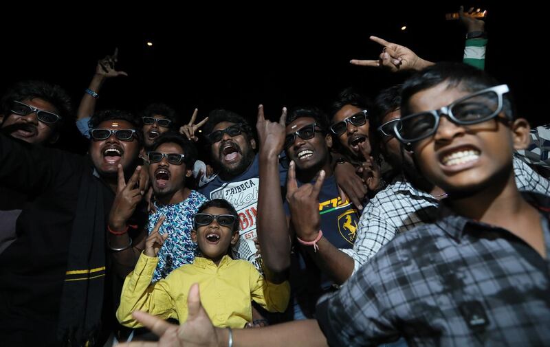 Fans react to his appearance on the screen. EPA