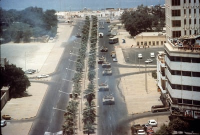 Aerial view of Iraqi tanks as they drive along a tree-lined boulevard during that country's invasion of Kuwait City, Kuwait, August 2, 1990. (Photo by The LIFE Images Collection/Getty Images)