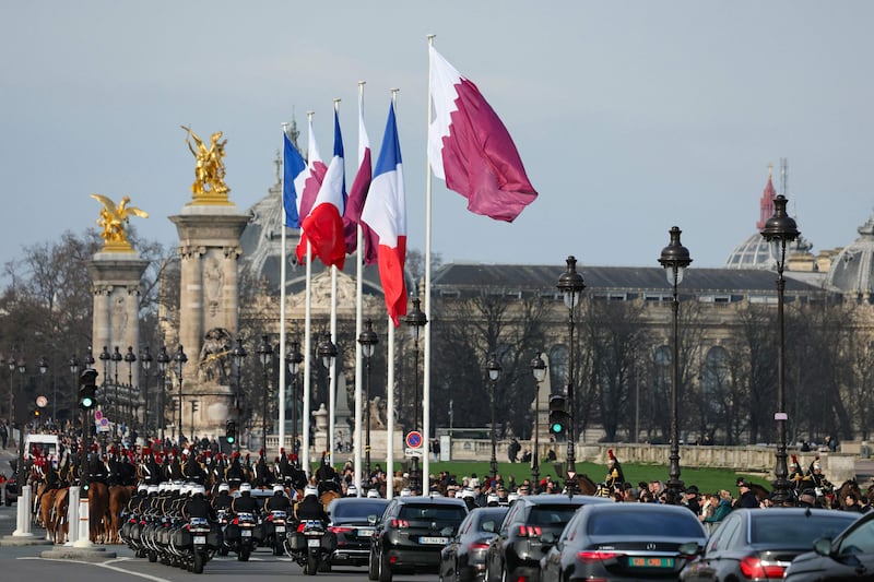 The convoy of Qatar's Emir Sheikh Tamim as he visits in Paris on February 27. AFP