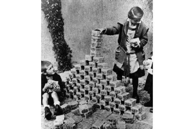 Children using bank notes as building blocks during German's inflation crisis.