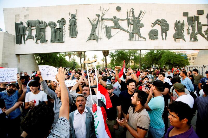 Iraqi shout slogans during a protest in Baghdad, Iraq July 16, 2018. REUTERS/Khalid Al-Mousily