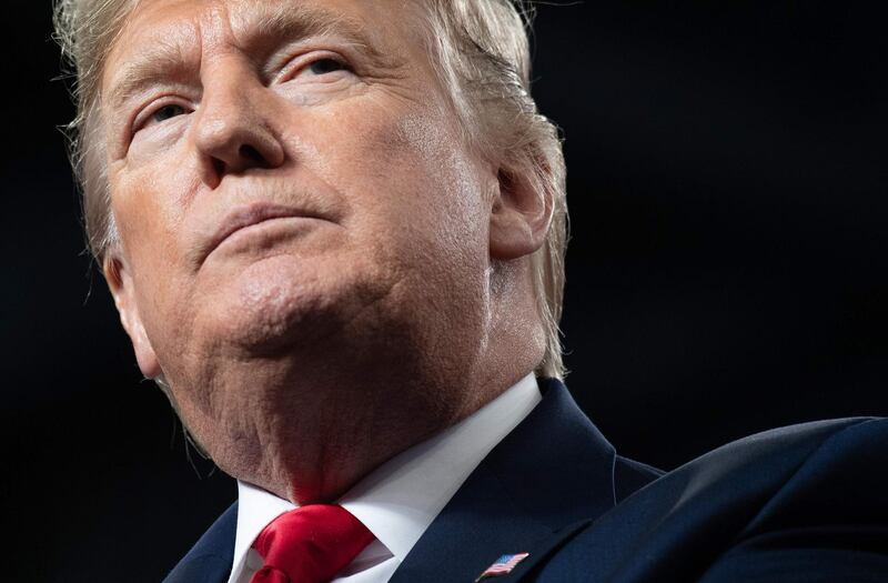 (FILES) In this file photo taken on January 9, 2020 US President Donald Trump speaks during a "Keep America Great" campaign rally at Huntington Center in Toledo, Ohio. The head of a Canadian food giant appeared to blame US President Donald Trump for the deaths of Canadians, including an employee's wife and child, in the downing of a jetliner in Iran. The Ukraine International Airlines Boeing 737 was shot down by a missile shortly after taking off from Tehran before dawn last January 8, 2020, killing all 176 passengers and crew on board. Fifty-seven of the victims were Canadian. Maple Leaf Foods chief executive Michael McCain said late January 12, 2020 in a Twitter message that a colleague lost his wife and child to a "needless, irresponsible series of events in Iran."

 / AFP / SAUL LOEB
