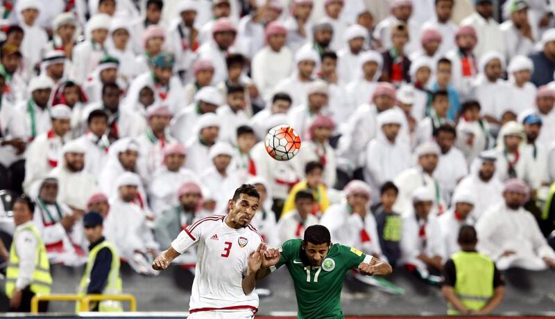 Saudi Arabia’s Taiseer Al-Jassam(R) fights for the ball with Walid Abbas(L) player of United Arab Emirates(UAE) during the FIFA World Cup 2018 Asian qualifying Group A soccer match between UAE and Saudi Arabia at Mohammed Bin Zayed Stadium- Aljazira Club in Abu Dhabi, United Arab Emirates on 29 March 2016. EPA/ALI HAIDER