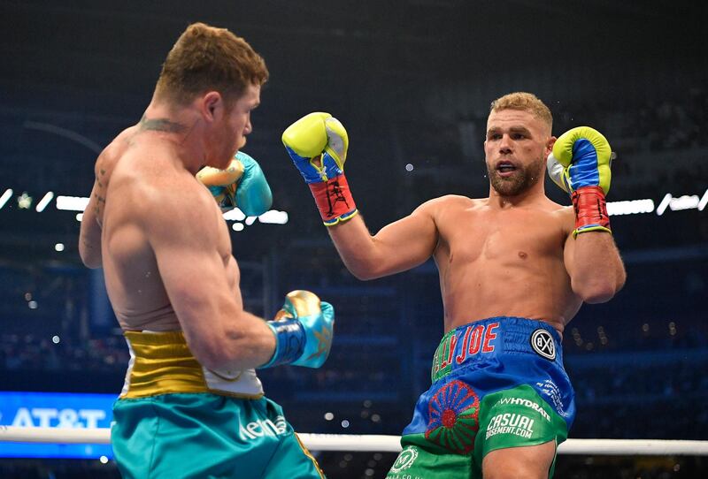 Saul Alvarez and Billy Joe Saunders during their super middleweight world title fight at AT&T Stadium. Reuters