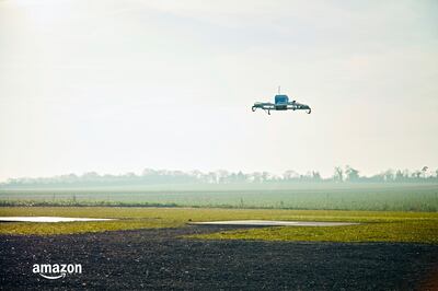 FILE- This Dec. 7, 2016, file photo provided by Amazon shows an Amazon Prime Air drone in Cambridgeshire, United Kingdom. Amazon founder and CEO Jeff Bezos might have underestimated regulatory obstacles and privacy concerns when he told CBSâ€™ â€œ60 Minutesâ€ in December 2013 that his company would be making drone-borne deliveries within five years. (Amazon via AP, File)