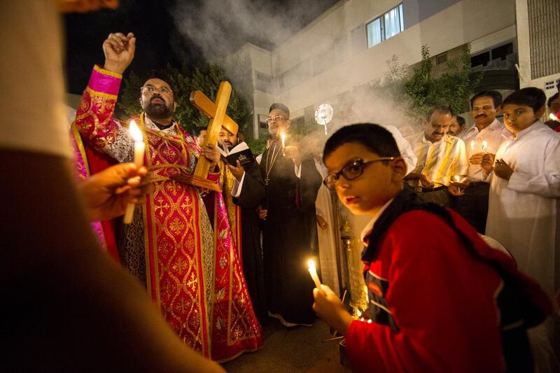 St Stephen’s Syrian Orthodox congregation Christmas Eve prayers at St Andrew’s Church in Abu Dhabi. Christopher Pike / The National

