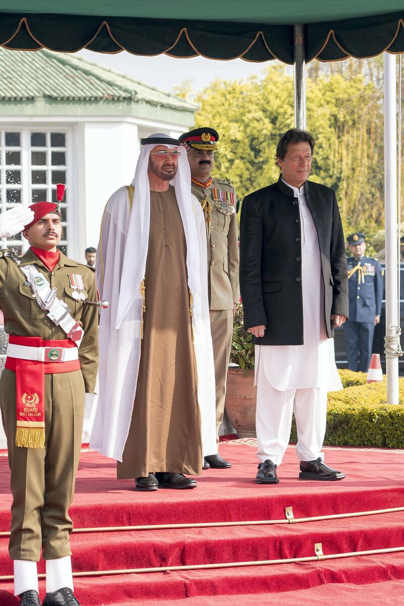 ISLAMABAD, PAKISTAN - January 06, 2019: HH Sheikh Mohamed bin Zayed Al Nahyan, Crown Prince of Abu Dhabi and Deputy Supreme Commander of the UAE Armed Forces (2nd R) and HE Imran Khan, Prime Minister of Pakistan (R), stand for a national anthem, during a reception held at the Prime Minister's residence.
( Rashed Al Mansoori / Ministry of Presidential Affairs )
---