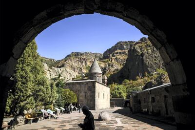 Tourists visit Geghard monastery, some 40kms from Yerevan on October 6, 2017.


 / AFP PHOTO / Kirill KUDRYAVTSEV