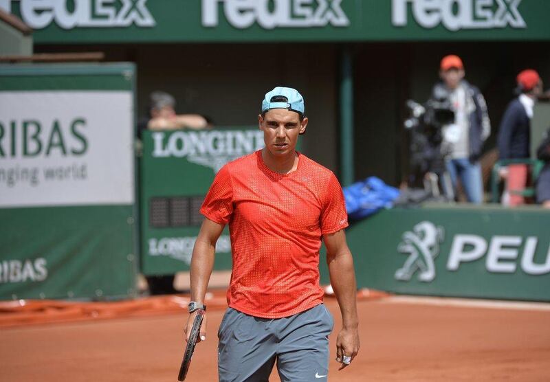 Rafael Nadal takes part in a training session at the Roland Garros on Friday ahead of the 2014 French Open. Miguel Medina / AFP / May 23, 2014