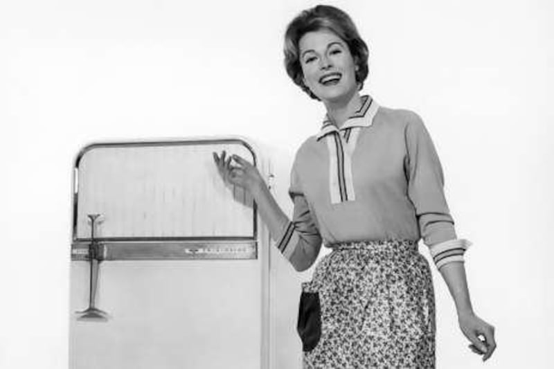 UNITED STATES - CIRCA 1950s:  Housewife with new refridgerator.  (Photo by George Marks/Retrofile/Getty Images)
