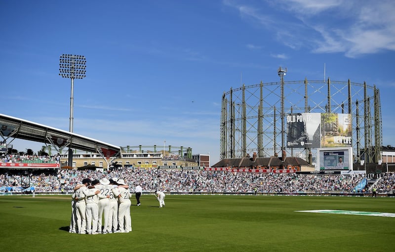 The England team in a huddle at The Oval on Sunday ahead of Australia's final innings in the final Ashes test of the summer. Getty