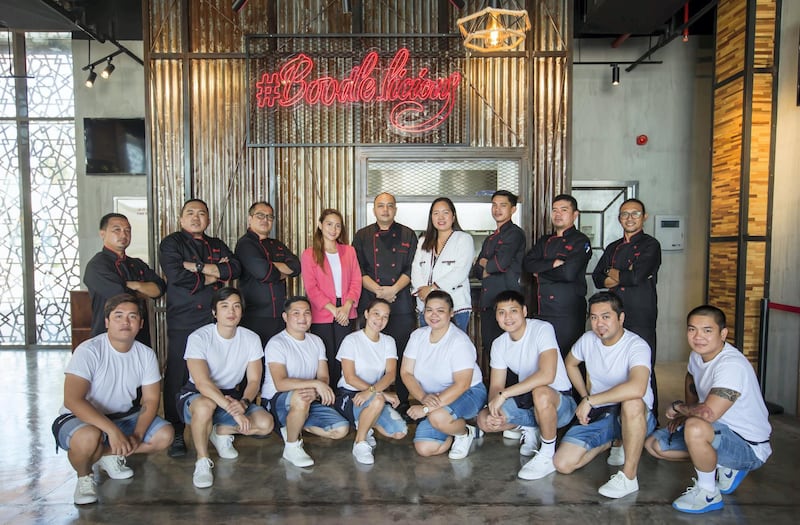 Spice & Grill in Al Majaz Sharjah.  Spice & Grill in Al Majaz Sharjah, Cristine Caringal-Melad and Lourds Adalia-Evertse owners of Spice & Grill at their resto with their staff.