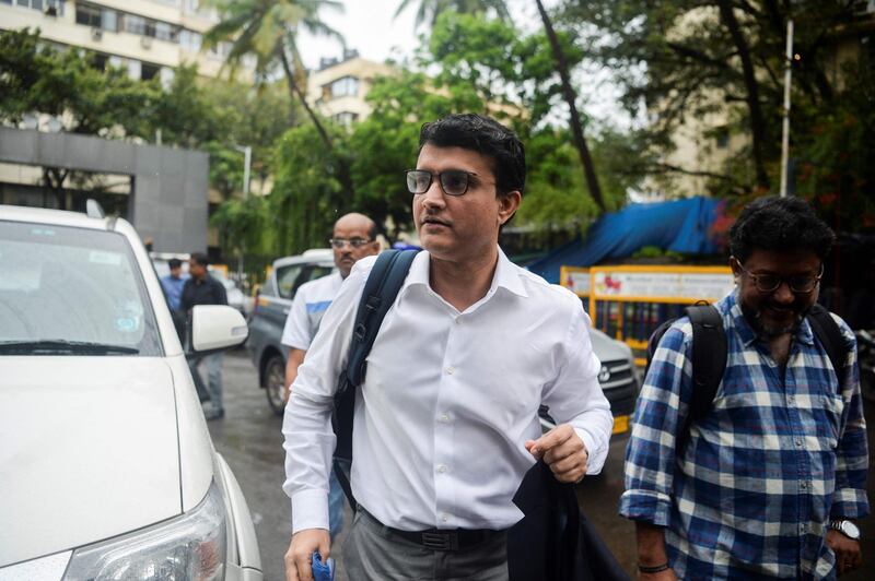 Former cricketer Sourav Ganguly (C) arrives for an electoral meeting at the Board of Control for Cricket in India (BCCI) headquarters in Mumbai on October 23, 2019. Former India captain Sourav Ganguly is poised to take over as the president of the country's cricket board as nominations closed Monday for elections to the sport's wealthiest and most powerful body. / AFP / Punit PARANJPE                      
