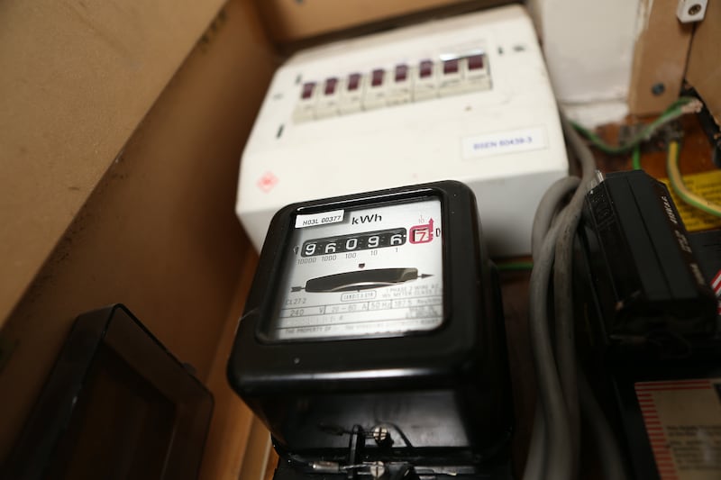 An electricity meter at a house in West Yorkshire. British households are facing soaring gas and electricity bills. EPA
