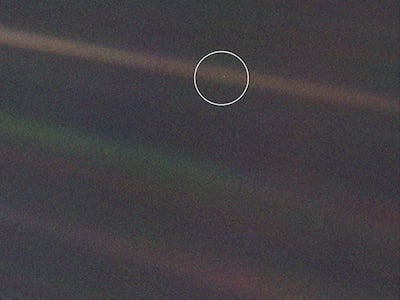 This was the first every 'portrait' of the solar system and was captured by Voyager 1. The Earth can be seen as a tiny dot in the image. Photo: Nasa