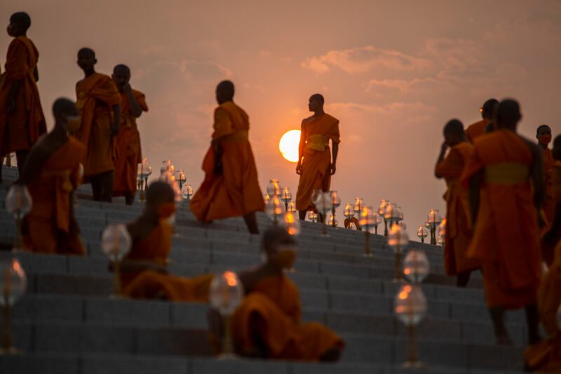 Monks participate in a Makha Bucha Day ceremony at Wat Dhammakaya temple. Getty