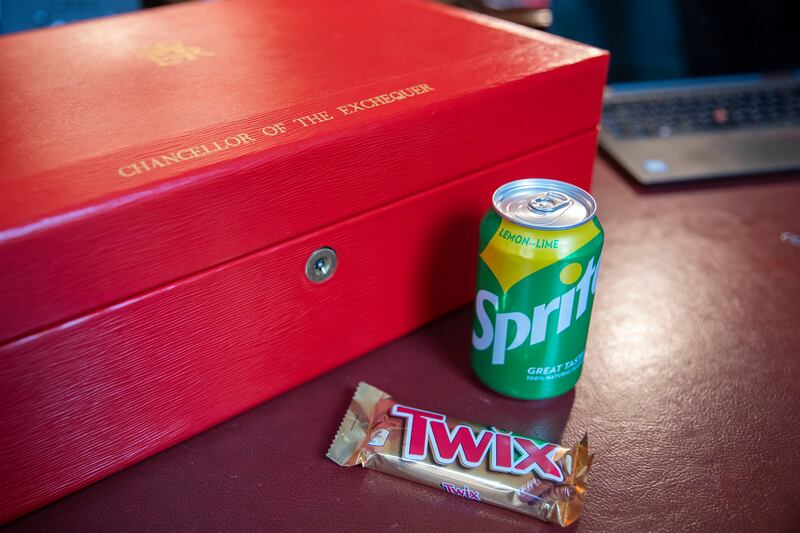 Food for thought? A can of Sprite and a Twix chocolate bar on Mr Sunak's desk before he delivers the budget.