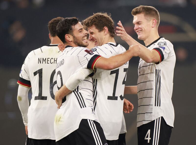 Germany forward Thomas Muller celebrates with teammates after scoring against Liechtenstein. AFP