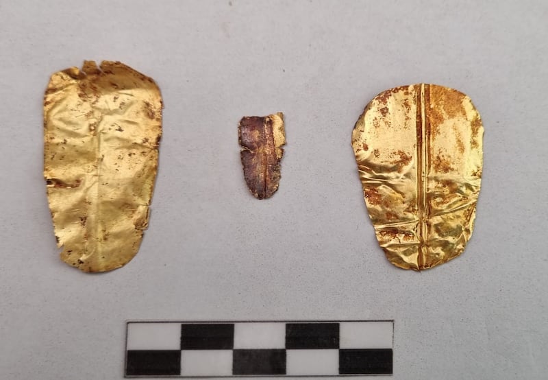 Three golden tongue-shaped amulets were found inside human remains dating back to the Roman period. All photos: Ministry of Tourism and Antiquities.