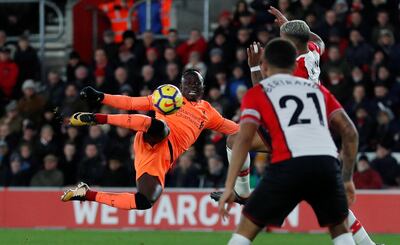 Soccer Football - Premier League - Southampton vs Liverpool - St Mary's Stadium, Southampton, Britain - February 11, 2018   Liverpool's Sadio Mane has a shot blocked by Southampton's Mario Lemina    Action Images via Reuters/Peter Cziborra    EDITORIAL USE ONLY. No use with unauthorized audio, video, data, fixture lists, club/league logos or "live" services. Online in-match use limited to 75 images, no video emulation. No use in betting, games or single club/league/player publications.  Please contact your account representative for further details.