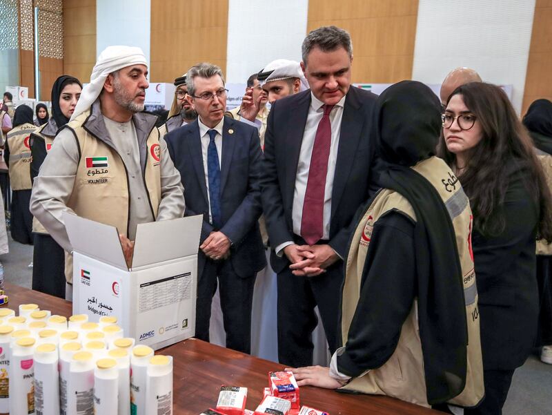 Dr Hamdan Musallam Al Mazrouei, Chairman of the Board of Directors of the Emirates Red Crecent with Tugay Tuncer, Ambassdor of Turkey and Syrian charge d'affaires, Ghassan Abbas at Adnec