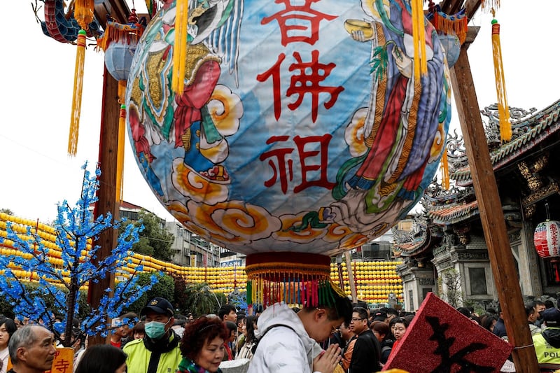 People pray inside the Lungshan Temple  in Taipei, Taiwan. EPA