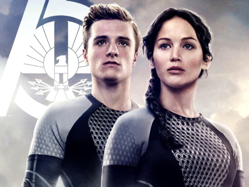 Jennifer Lawrence and Josh Hutcherson in "The Hunger Games: Catching Fire."  A&L cover, Nov. 2013.
CREDIT: Courtesy Lionsgate *** Local Caption ***  al21no-Hunger-Cover.jpg