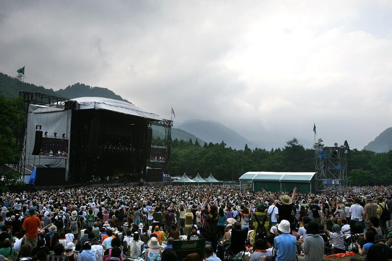 YUZAWA, JAPAN - JULY 26:  People enjoy a concert during the Fuji Rock Festival at Naeba Ski Resort on July 26, 2008 in Yuzawa, Niigata, Japan.  (Photo by Kiyoshi Ota/Getty Images)