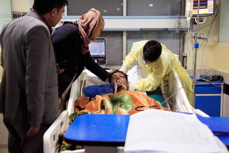 A victim receives treatment at hospital after suicide attack in Kabul after a suicide bombing in the Afghan capital on October 24, 2020.  AP