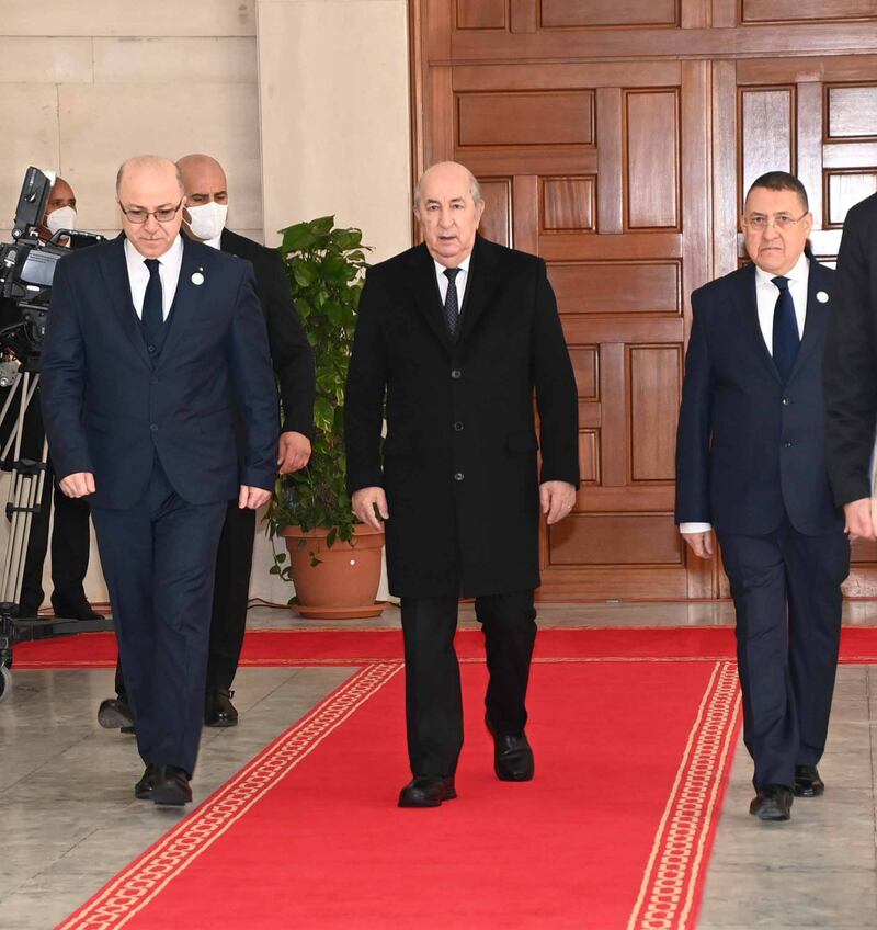 Mr Tebboune, centre, at the Palace of Nations in Algiers