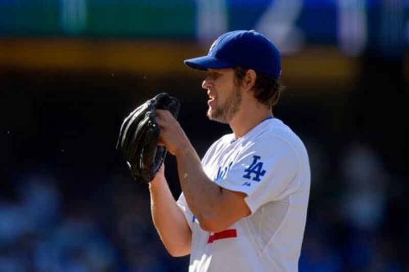 Clayton Kershaw lowered his major league-leading ERA to 1.88 with eight innings of three-hit ball and had a two-run single.