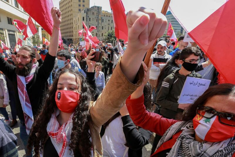 FILE PHOTO: Demonstrators take part in a protest against mounting economic hardships in Beirut, Lebanon March 28, 2021. REUTERS/Aziz Taher/File Photo