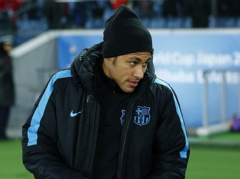 Neymar walks towards the bench before the Club World Cup semi-final. Thomas Peter / Reuters